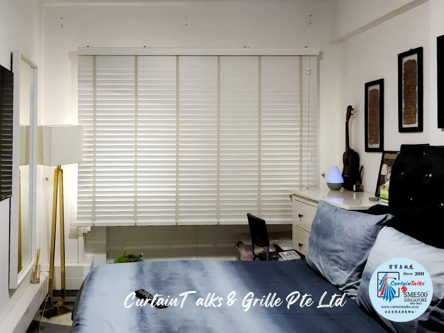 This is a Picture of Wooden blinds installed at Singapore HDB 736 Tampines Street 72 Master room